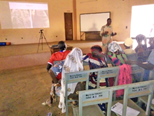 Mori Gouroubera using the projector in Benin
